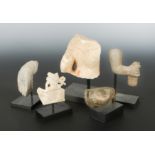 A group of Chinese white marble and limestone Buddhist head/hand/torso fragments,
