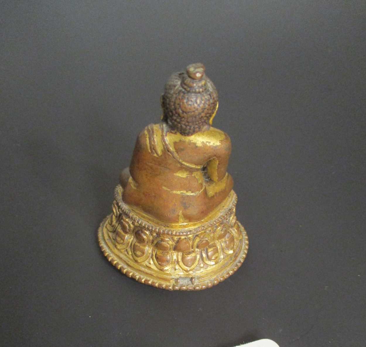 A Khassamalla type gilt copper Buddha, perhaps 14th/15th century, - Image 2 of 3