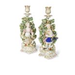 A pair of Chelsea figural bocage candlesticks,