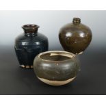 A group of three Chinese pots, a black glazed vase, Henan type, Song style,