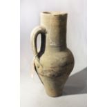 A pottery jug, possibly English or French 14/15th century,