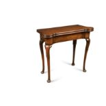 George II mahogany fold over card table,