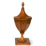 A George III partridge wood pedestal urn-shaped tea caddy,