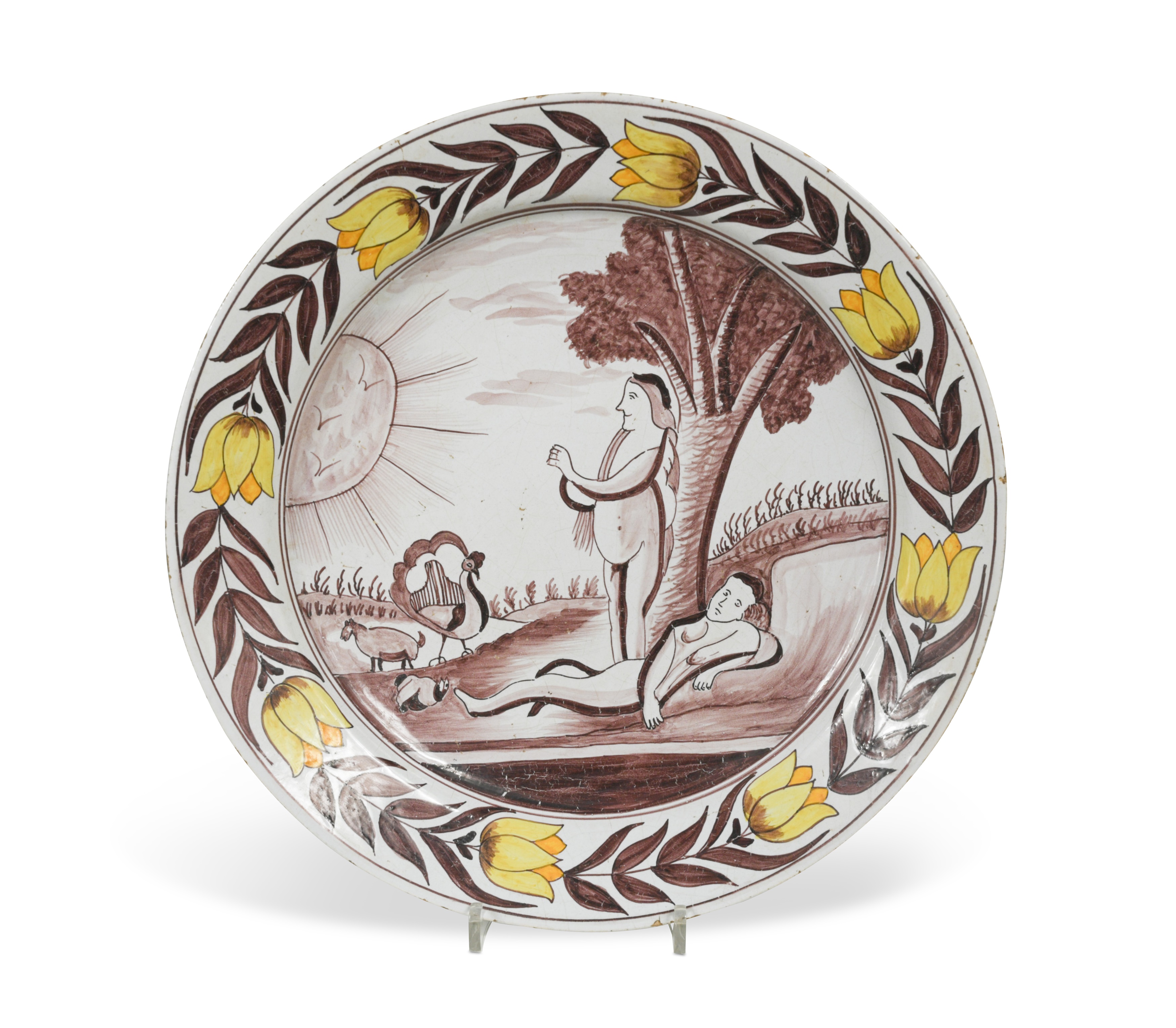 An 18th century Delft polychrome 'Adam and Eve charger,