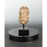 A Chinese cast iron head of an Official, probably late Ming Dynasty,
