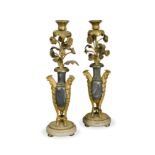 A pair of 19th French gilt bronze and marble candlesticks,
