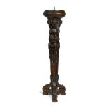 A late 16th or early 17th century Flemish carved pricket candlestick,