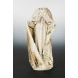 A French carved limestone torso fragment of an enrobed bishop saint,