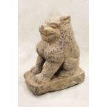 A Chinese grey stone Buddhist guardian lion, in 6th/7th century style,