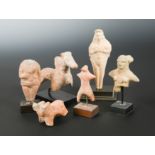 A group of six ancient Cypriot and other pottery figures and animals,