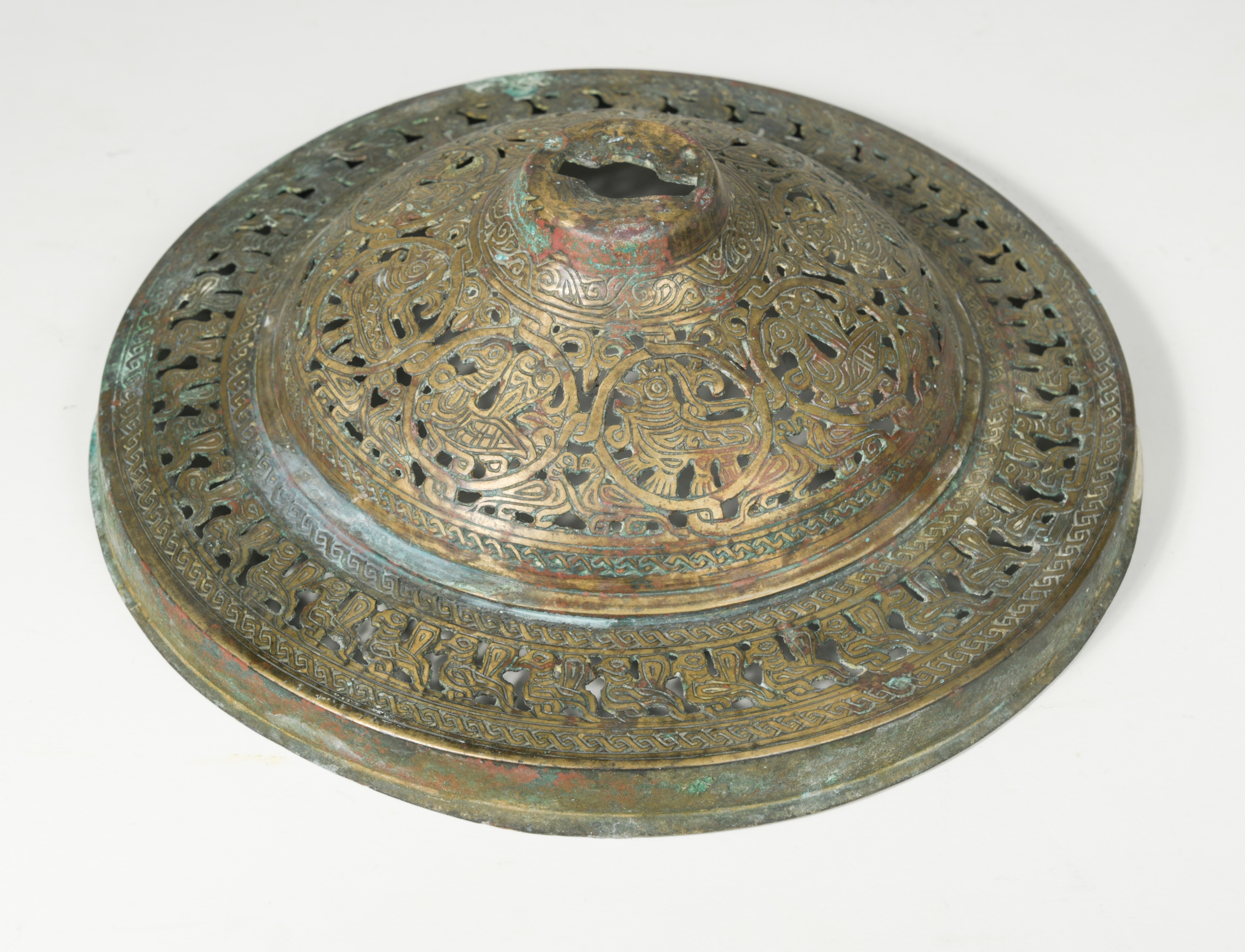 An Islamic Persian metalwork roundel, possible Seljuk Khorasan, 12th century,