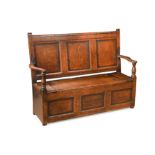 An oak and fruitwood banded three panelled box settle, 18th century,