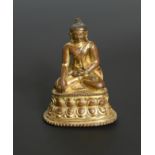 A Khassamalla type gilt copper Buddha, perhaps 14th/15th century,