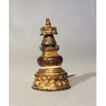 A Tibetan gilt copper small Stupa, 19th century,