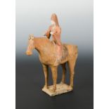 A Chinese polychrome painted pottery horse with Middle Eastern rider, in Tang Dynasty Style