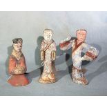 A group of three Chinese painted pottery figures, perhaps Han Dynasty,