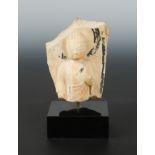 A Chinese white marble fragmentary figure of a Buddha, head and upper body,