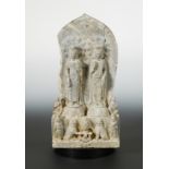 A Chinese limestone double Bodhisattva stele with acolytes,