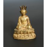 A Tibetan gilt bronze figure of a Lama, perhaps Zangpo Gyeltsen, 18th/19th century,