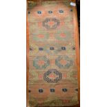 A Tibetan wool rug, circa 1900-1930
