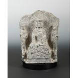 A Chinese grey veined stone Buddhist triad group, also on reverse, in Eastern Wei style,
