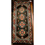 A Sino-Tibetan wool carpet, circa 1920-1940