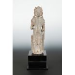 A Chinese limestone standing figure of Avalokiteshvara, Northern Qi Dynasty style,