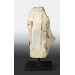 A Chinese limestone Buddhist deity, torso only, perhaps Wei Dynasty,