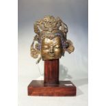 A Tibetan fragmentary bronze head of Avalokiteshvara, probably 16th/17th century,