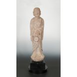A Chinese red sandstone standing arhat, in Tang Dynasty style,