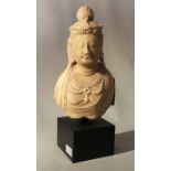 A Chinese white crystalline marble upper body and head of the Bodhisattva Guanyin, in Tang style,