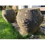 A pair of Chinese carved grey stone garden barrel seats, probably 19th century,