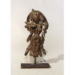 A West Tibetan fragmentary bronze figure of the four armed deity Chenrezig, 16th/17th century,