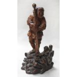 An Asian carving of a boy, late 19th century,