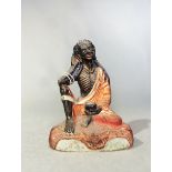 A Tibetan painted plaster figure of Milarepa fasting, 19th century,