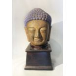 A carved stone head of a Buddha, 20th century in Tang Style