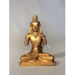 A Tibetan gilt bronze seated Amitayus, 18th century,