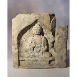 A Chinese white stone architectural panel in relief with a meditating Buddha, in Tang Dynasty style,