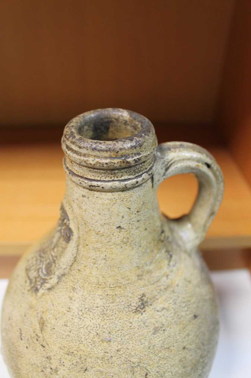 A stoneware Bellarmine jug, - Image 3 of 5