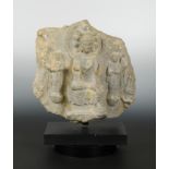 A Chinese limestone Buddhist stele group, Wei Dynasty style,