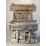 A Chinese grey pottery, two storey building with two figures within, probably Han Dynasty,