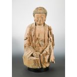 A Chinese carved and polychrome wood seated figure of Sakyamuni Buddha, in Jin style,