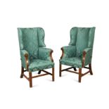 A pair of mahogany ratchet-back wing armchairs, late 18th/early 19th century,