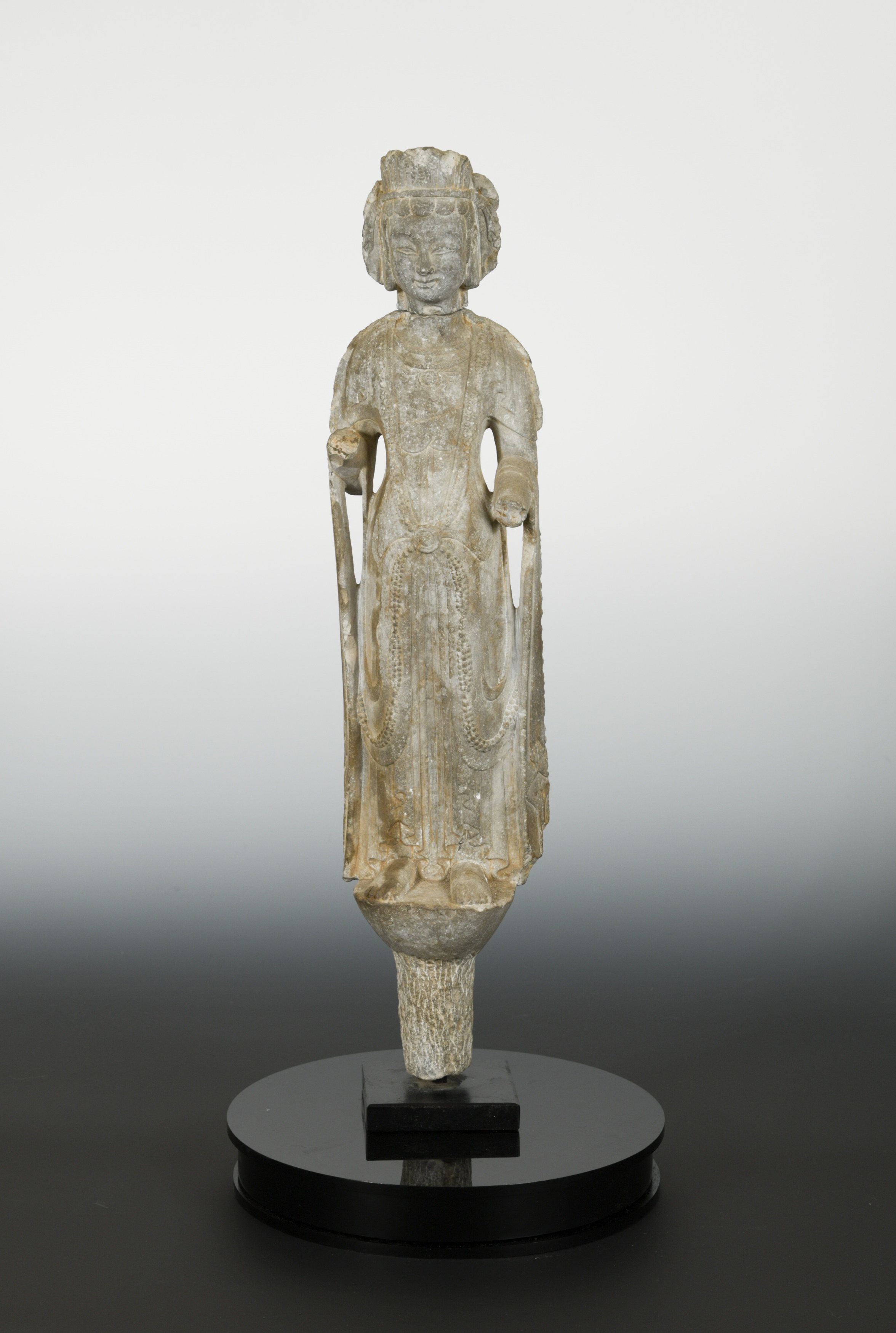 A Chinese limestone standing Avalokiteshvara, in Northern Qi style,