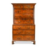 A George III walnut chest on chest,