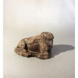 A Chinese brown mottled stone recumbent figure of a cloven mythical creature, in Sui Dynasty style,