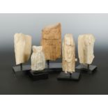 Five Chinese white marble fragmentary Bodhisattva/Maitreya figures, all in Northern Wei /Qi style