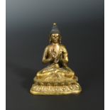 A Sino-Tibetan gilt bronze Buddha, 19th century,