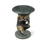 A small side table modelled as a blackamoor,