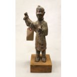 A Chinese bronze figure of a standing soldier, in Han Dynasty style,